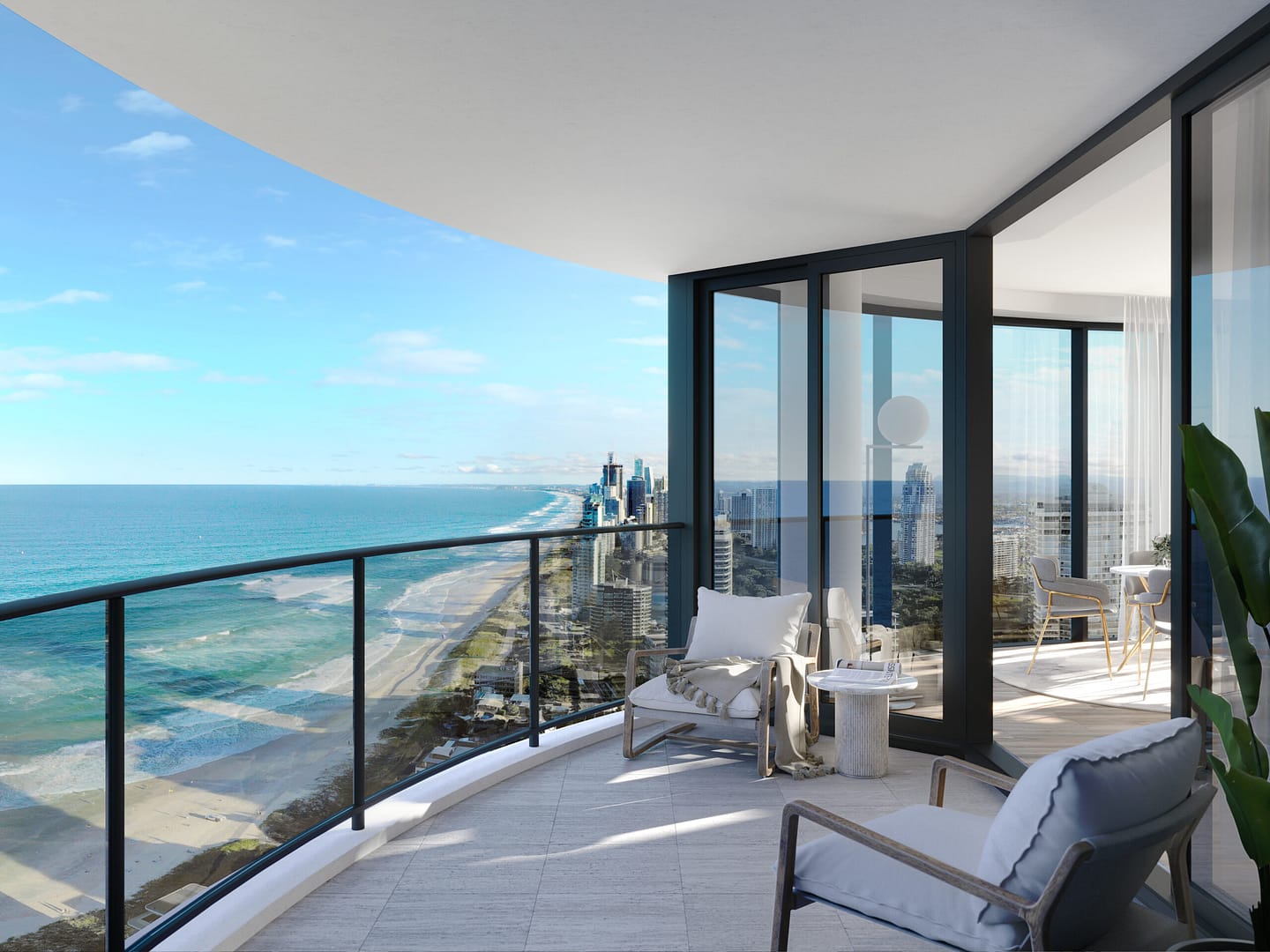 Balcony view of ocean in high rise luxury apartment