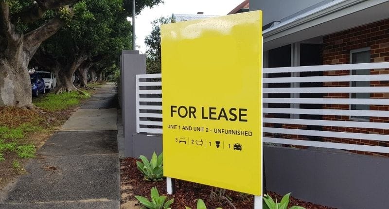 Australian house with for lease sign at front
